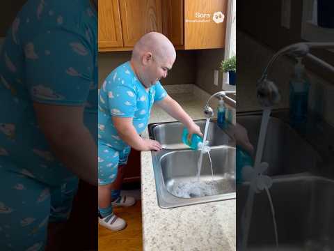 Little pickle climbs into the sink