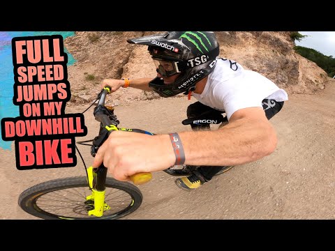 RIDING HUGE FULL SPEED JUMPS ON MY DOWNHILL BIKE - AUDI NINES IS INSANE!