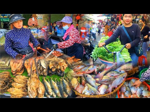 Khmer food outside the pot. Visit fish, vegetables, fresh pork. Seller and buyer action.