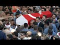 Recep Tayyip Erdogan helps carry coffin of Turkey coup victim