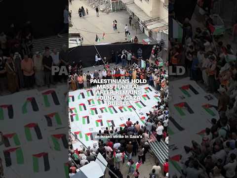 Palestinians hold mass funeral after remains found in Gaza rubble