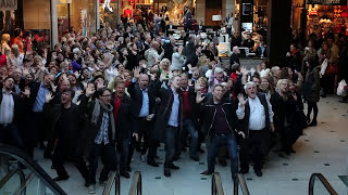 Flashmob in Stockholm. 150 people singing Euphoria in the middle of a shopping mall