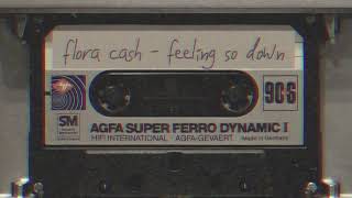 Kadr z teledysku Feeling So Down tekst piosenki Flora Cash