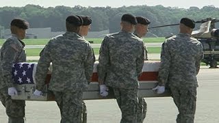 Raw: Body of U.S. General Arrives at Dover AFB