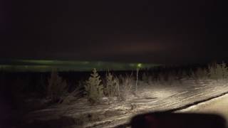 Aurora borealis teasing behind clouds in the distance  Feb 16th 2017