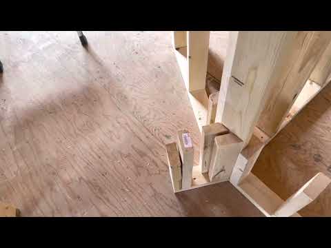 Framing of an angled wall for a door and closet in a bedroom....