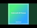 Underneath Mi Pressure