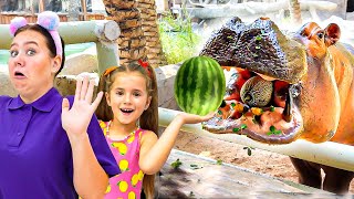 Ruby and Bonnie feed the animals at the Emirates Park Zoo