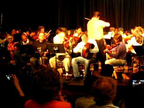 Traonach plays slip jigs with DeWitt Middle School Orchestra