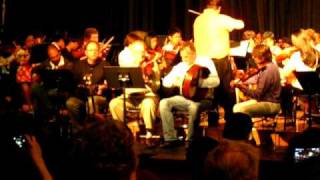 Traonach plays slip jigs with DeWitt Middle School Orchestra
