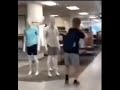 guy punches a mannequin's head and it flies off
