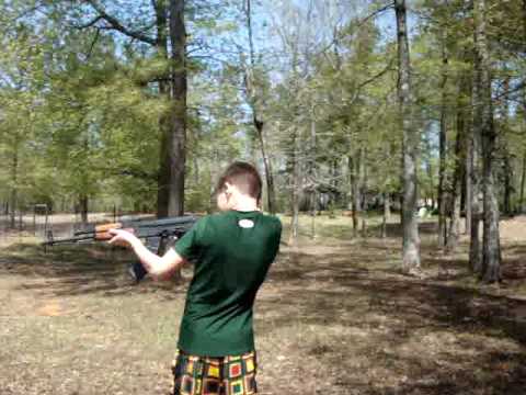 Robert Firing AK-47 at Johnny's