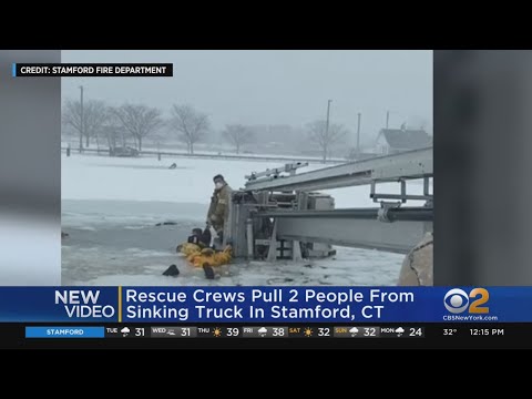 Crews Save 2 People From Sinking Truck