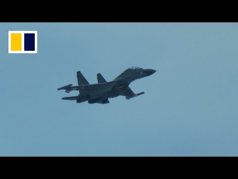 Chinese fighter jet flies close to Philippine coastguard plane in South China Sea