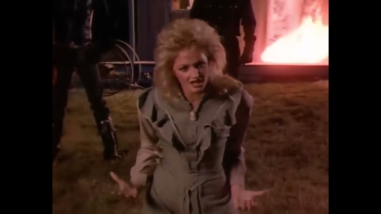 Bonnie Tyler - Holding Out For A Hero Lyrics And Videos