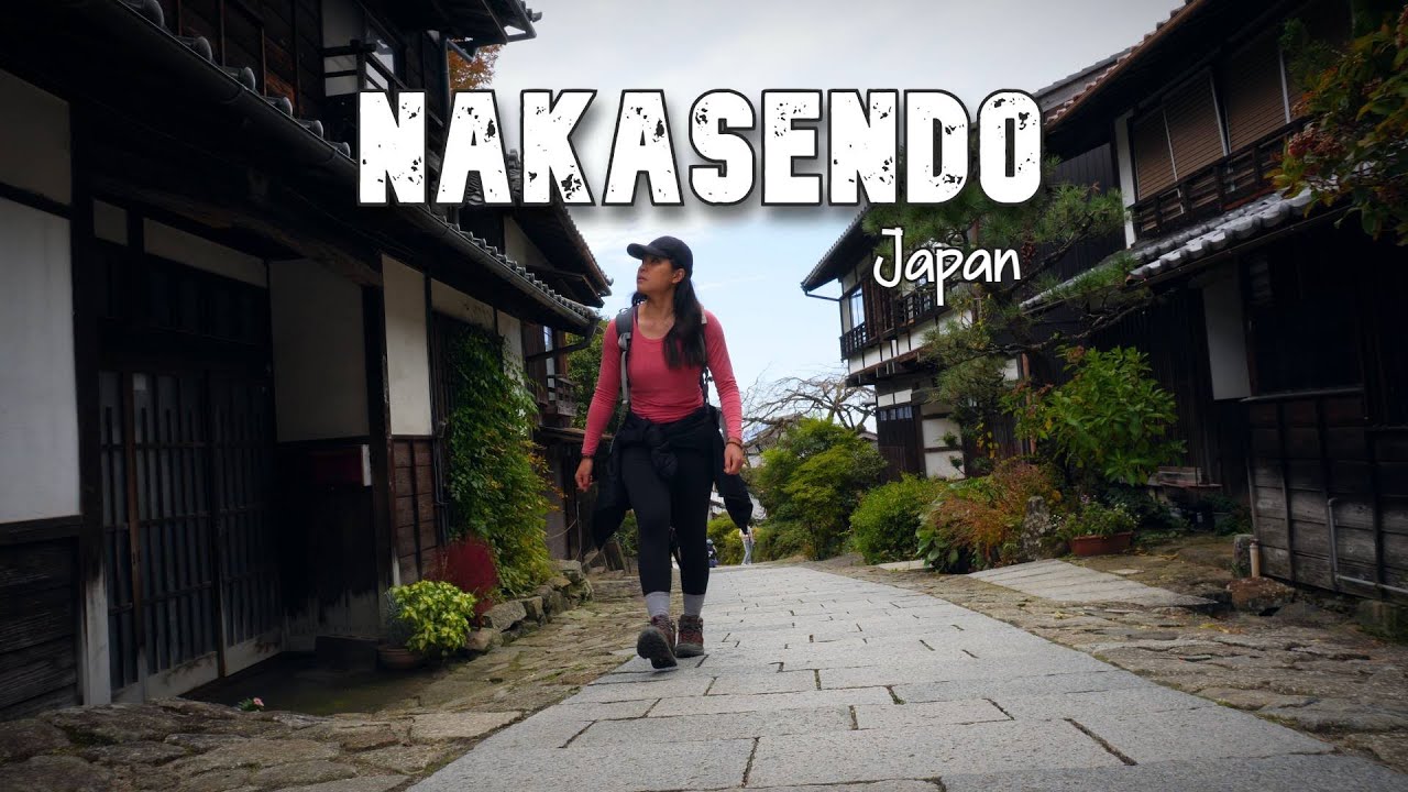 A traveler embarks on an exhilarating hike along the scenic Nakasendo Trail.
