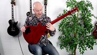 Download the video "Vintage® ReIssued V100NBCSB Electric Guitar"