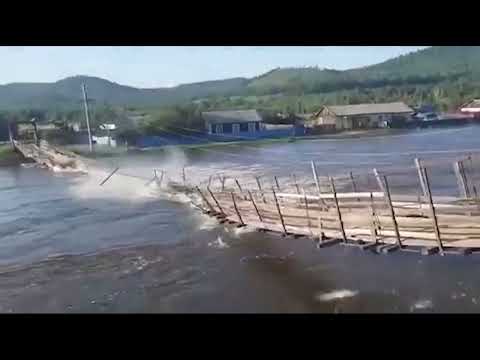 A Pedestrian Wooden Bridge Collapses While A Car Trying To Cross During Flood In Russia