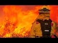 Residents flee San Diego wildfires - YouTube