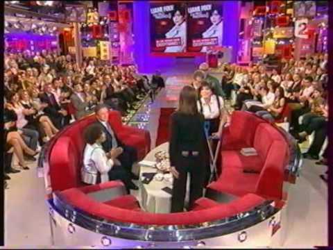 Liane Foly on crutches