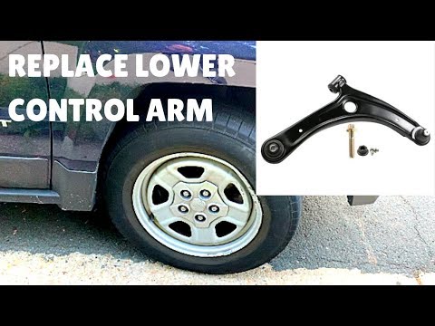Installing a lower control arm on a Jeep Patriot