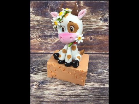 Лепим коровку из мастики