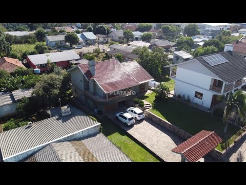 CASA COM 3 DORMITÓRIOS, 2 VAGAS, 220M² ÁREA PRIVATIVA para venda EM VINTE E CINCO DE JULHO