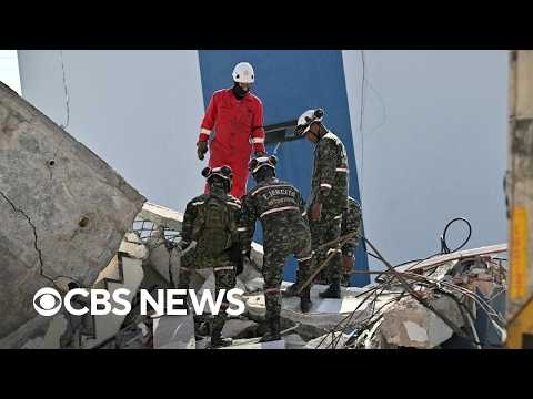 Emergency crews in Colombia desperately search for earthquake survivors