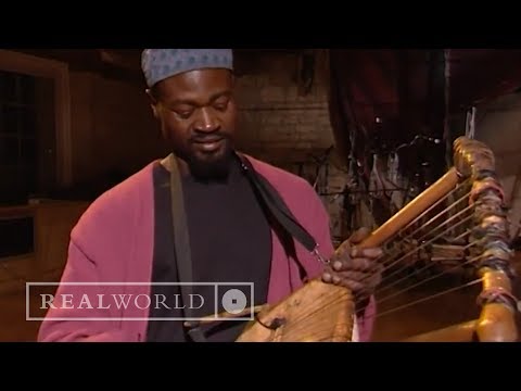 Ayub Ogada demonstrates a Nyatiti (African instrument)