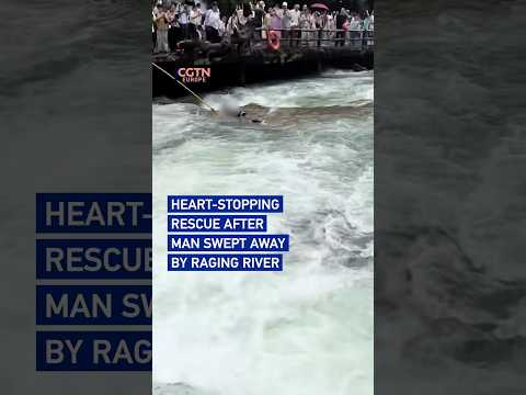 Heart-stopping rescue after man swept away by raging river
