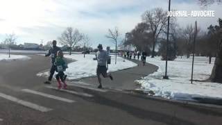 Participants in Sterling's annual Turkey Trot run through Columbine Park
