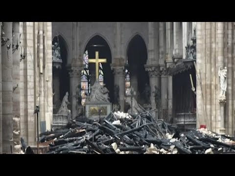 The inferno that raged through Notre Dame Cathedral for more than 12 hours destroyed its spire and its roof, but spared its twin medieval bell towers. Video captured the cathedral's damaged interior early Tuesday. (April 16)