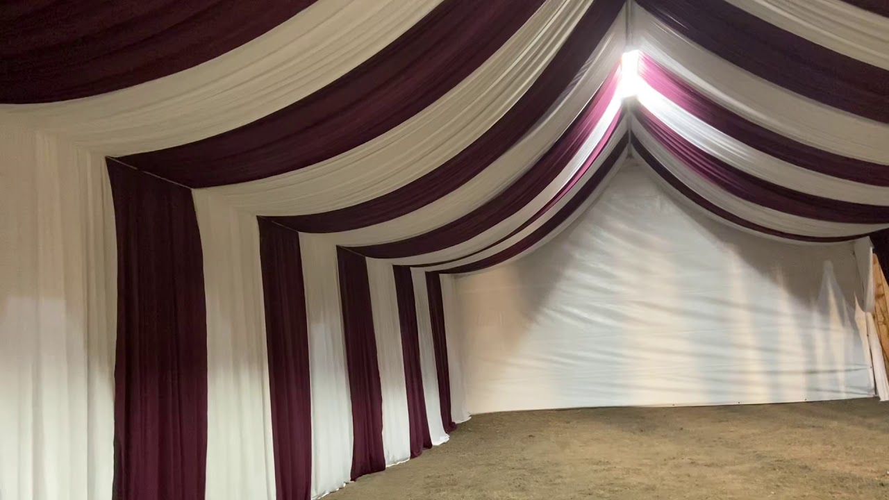 Carpa 20x40 con draping blanco y burgundy