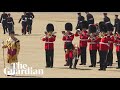 Soldier faints during trooping the colour rehearsal in London heatwave