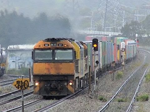 Coal train and Superfreighter cross at Sandgate - Pacific National Australian Trains