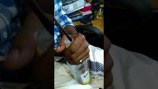 How to open nozzle from bacardi bottle