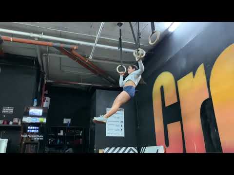 Pull ups with arm reach on rings