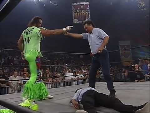 Macho Man snaps & gets DQ'd. Ref gets The Elbow Drop & Macho gets escorted out by Cops! (WCW)