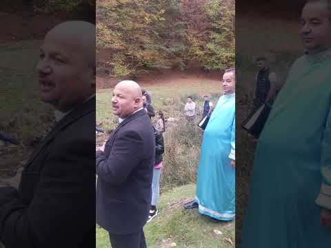 BAPTISM IN THE RIVER IN SIBIU