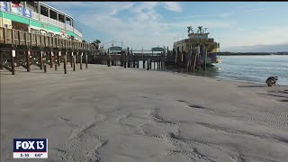 Low tides show damage done by sand in John's Pass