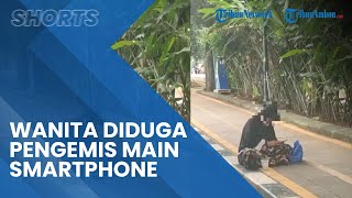 Viral Wanita yang Diduga Pengemis Duduk di Trotoar Pajajaran Bogor Tepergok Main Smartphone