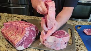 How to cut a bone-in rib roast into boneless rib eye steaks