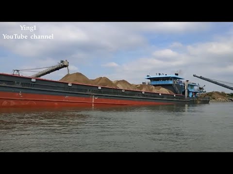 Barge loading and unloading 5200 tons of river sand !