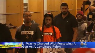 Rapper Lil Wayne Hit With Gun Charge In Miami