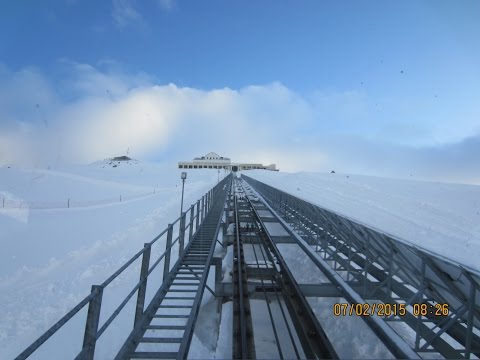 Muottas Muragl Funicular bahn winter ascend. Punt Muragl, Graubünden, Switzerland
