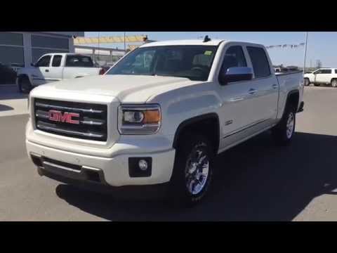 White 2015 GMC Sierra SLT 1500 4WD Crew Cab Truck at Scougall Motors in Fort Macleod, AB.