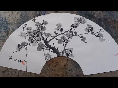 Sumi-e ink painting demonstration of plum blossom