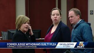 Former judge withdraws guilty plea