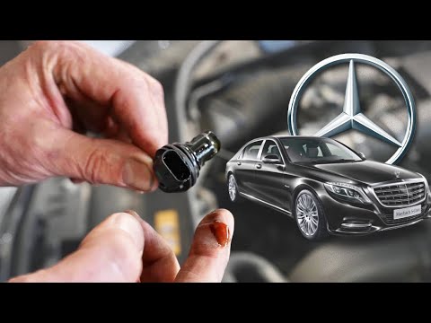 Mercedes S Class with oil in wiring harness what is the cause and correction?