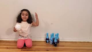 Dania playing  Bowling after homework